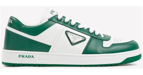 dark green prada sneakers.